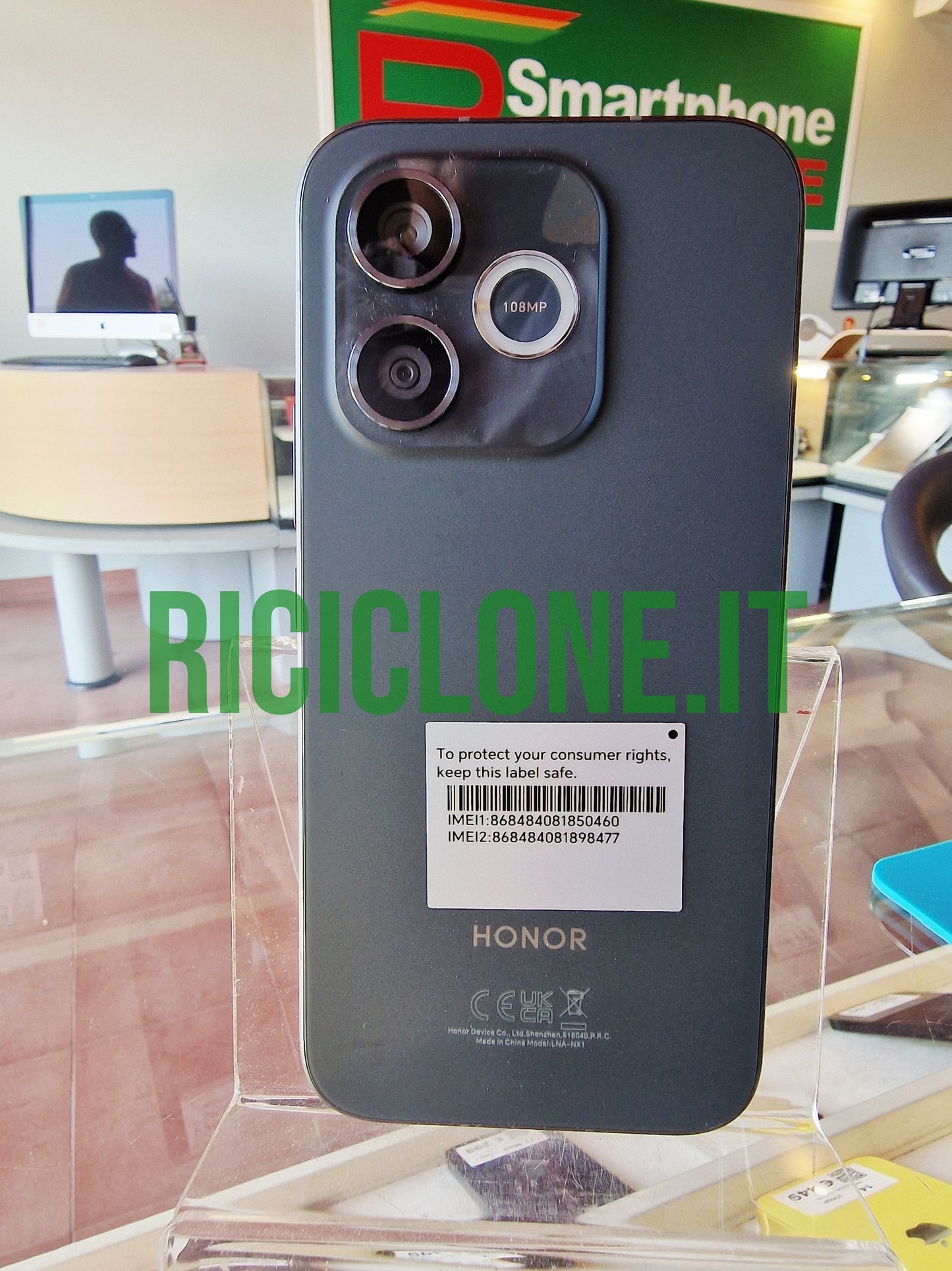 Honor 600 Lite black smartphone rear view with 108MP camera module and matte finish