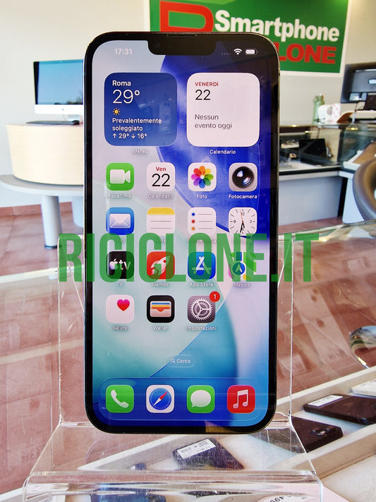 Apple iPhone 13 Pro Max 1TB blue front view with iOS home screen on acrylic stand